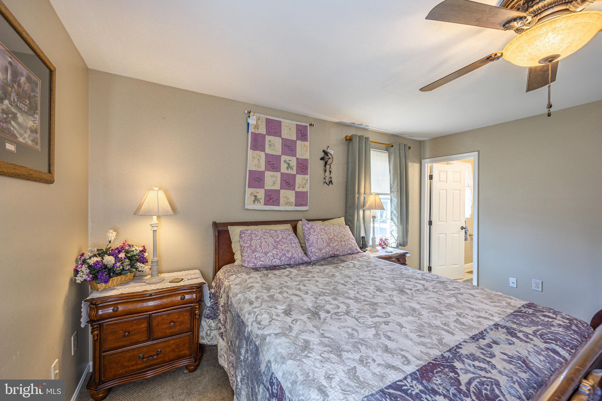 716 Paradise Road Aberdeen, MD 21001 - Photo 59 of 85 a bedroom with a bed and a window