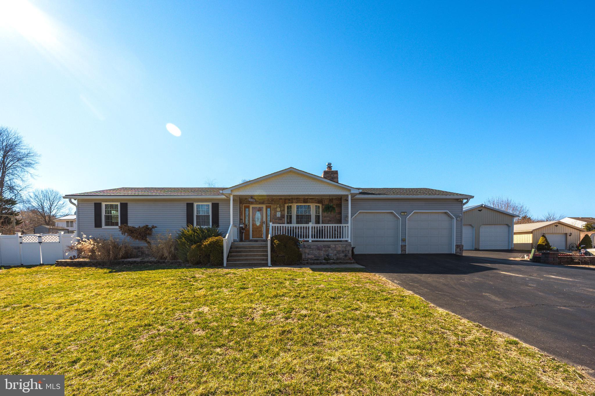716 Paradise Road Aberdeen, MD 21001 - Photo 6 of 85 a front view of a house with a yard