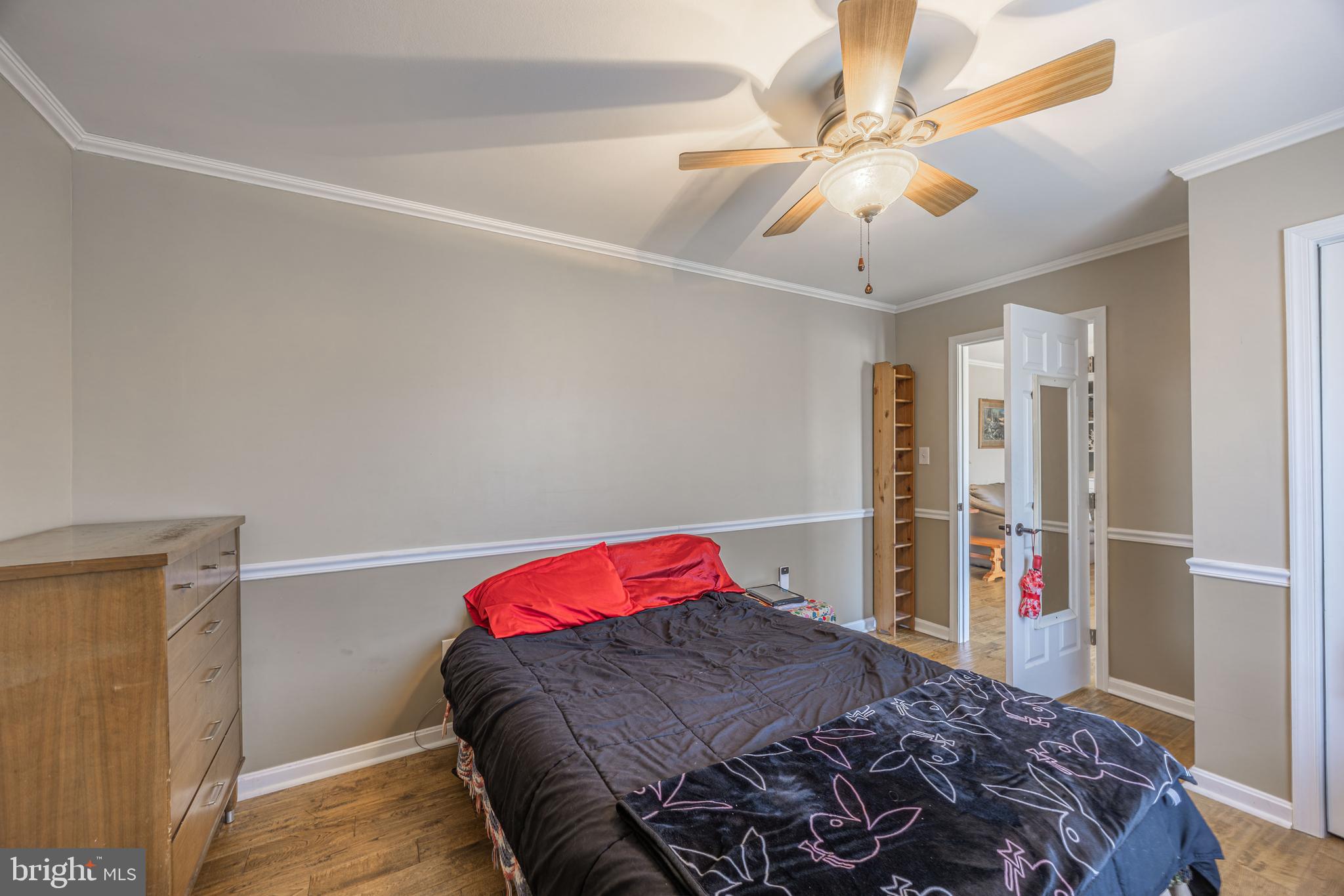 716 Paradise Road Aberdeen, MD 21001 - Photo 63 of 85 a bedroom with a bed and a walk in closet