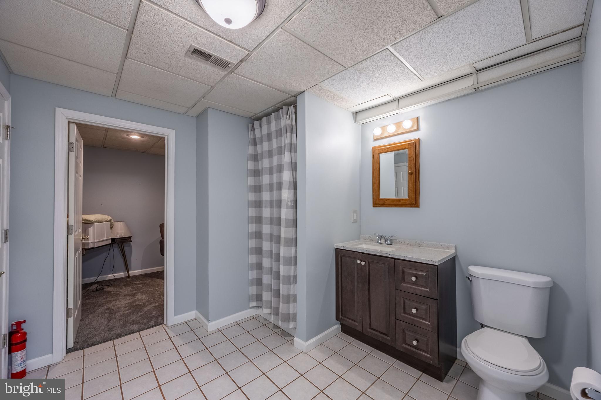 716 Paradise Road Aberdeen, MD 21001 - Photo 67 of 85 a spacious bathroom with a toilet sink and mirror