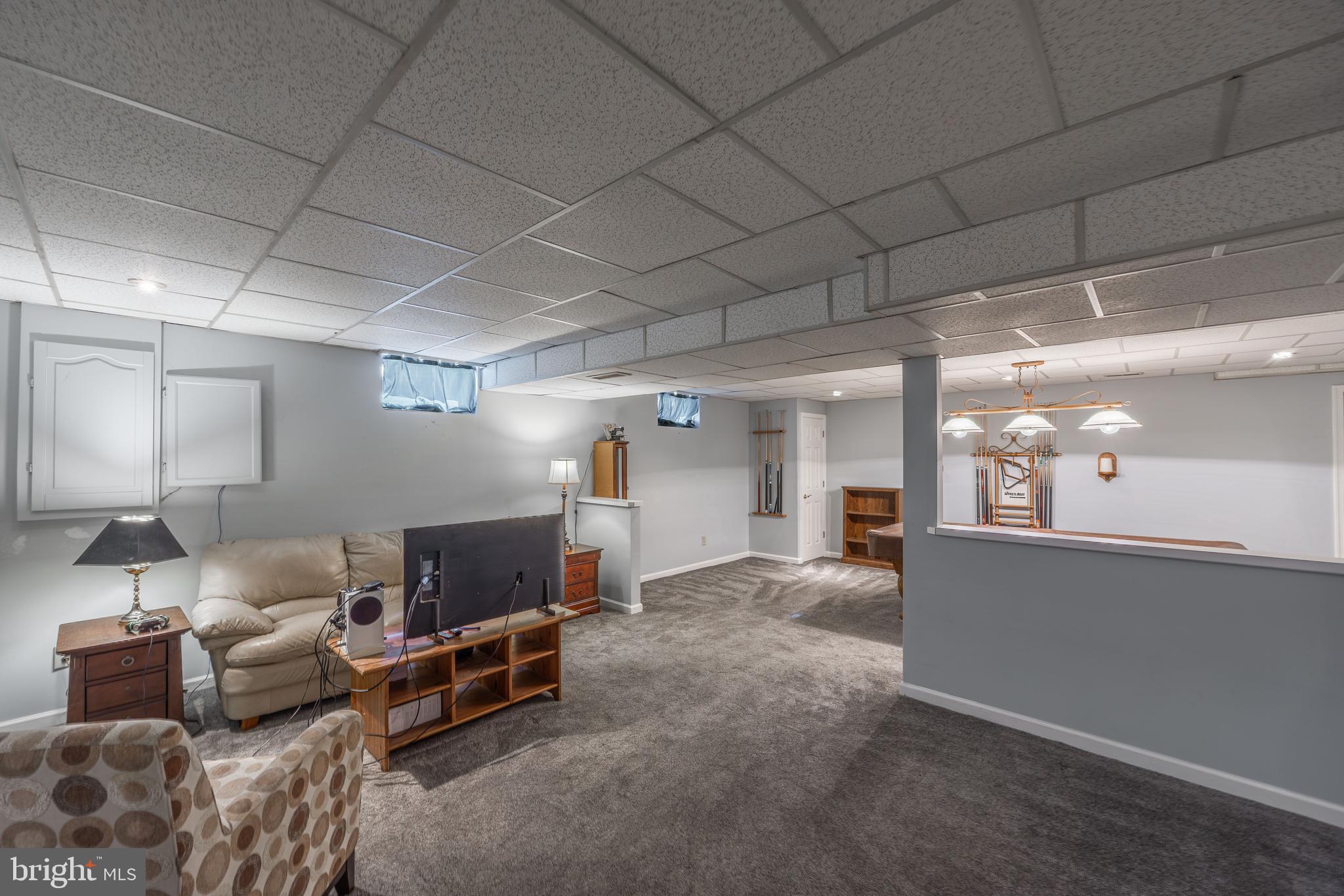 716 Paradise Road Aberdeen, MD 21001 - Photo 76 of 85 a living room with furniture and a table