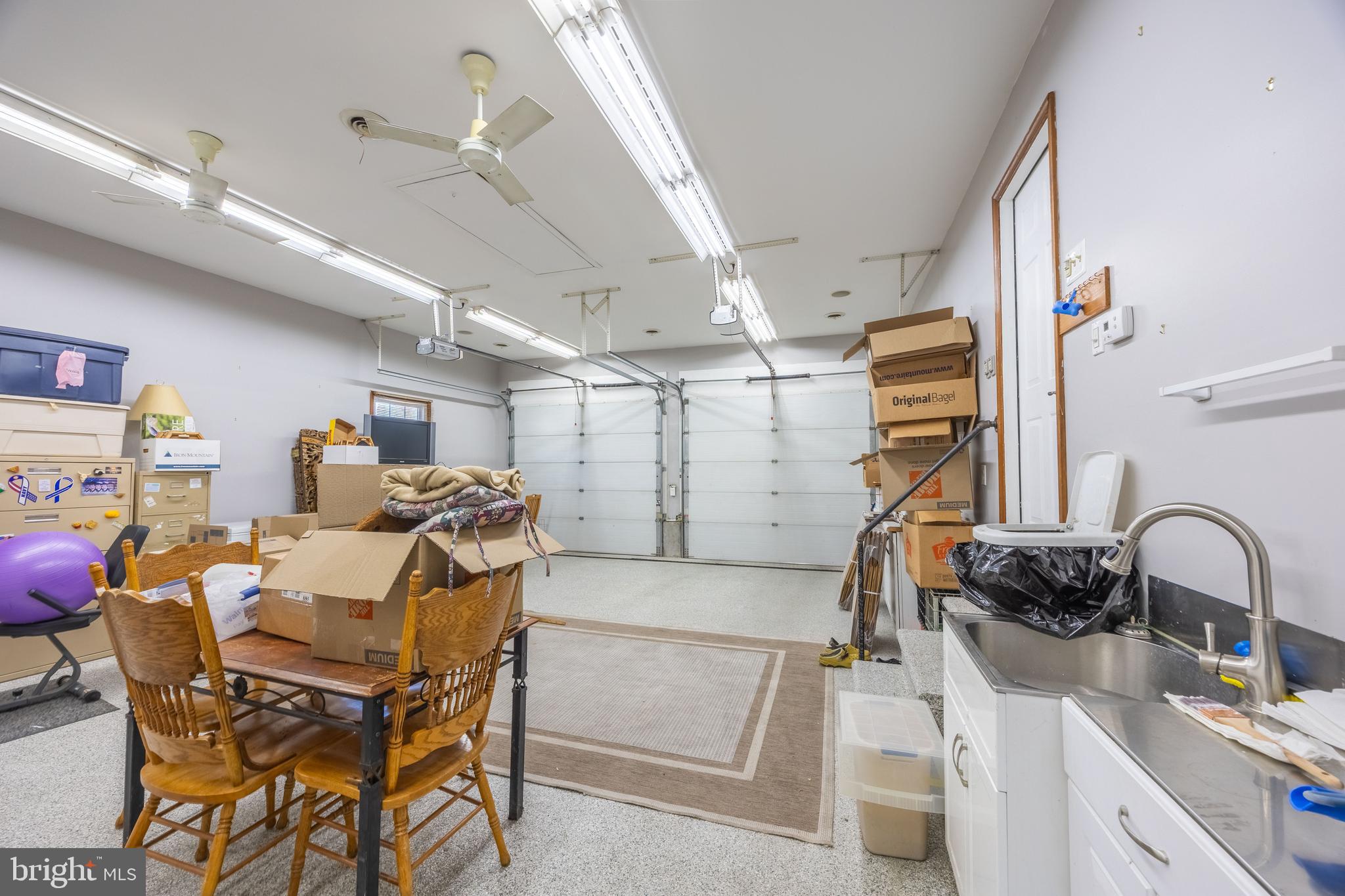 716 Paradise Road Aberdeen, MD 21001 - Photo 83 of 85 a kitchen with stainless steel appliances kitchen island granite countertop a sink and cabinets