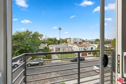 a living room with a couch and a flat screen tv