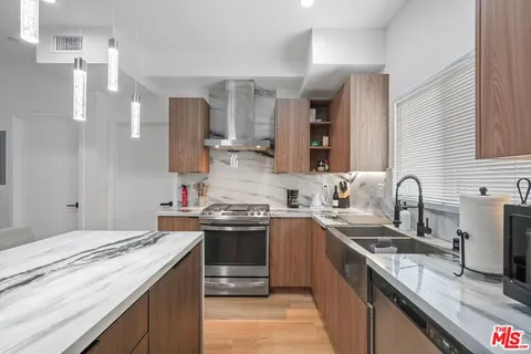 a workspace with furniture and wooden floor