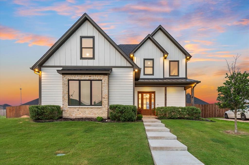 2100 Palafox Drive Waco, TX 76655 - Photo 1 of 1 a front view of a house with a yard and garage