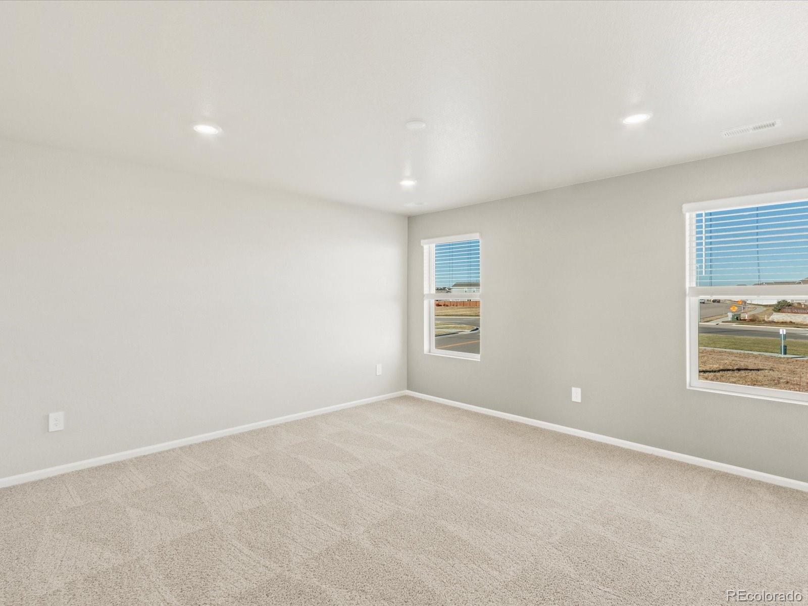 851 Frst Cyn Road Severance, CO 80550 - Photo 19 of 37 an empty room with windows