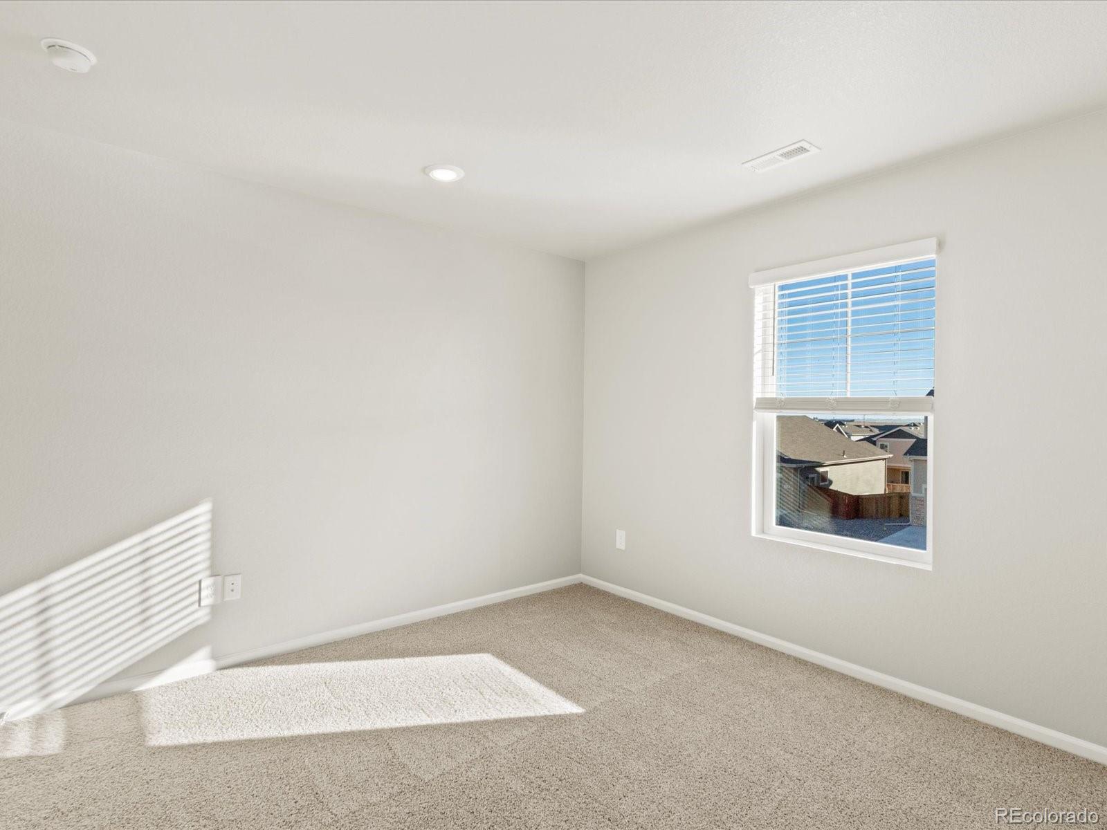 851 Frst Cyn Road Severance, CO 80550 - Photo 26 of 37 a room with a white wall and a window