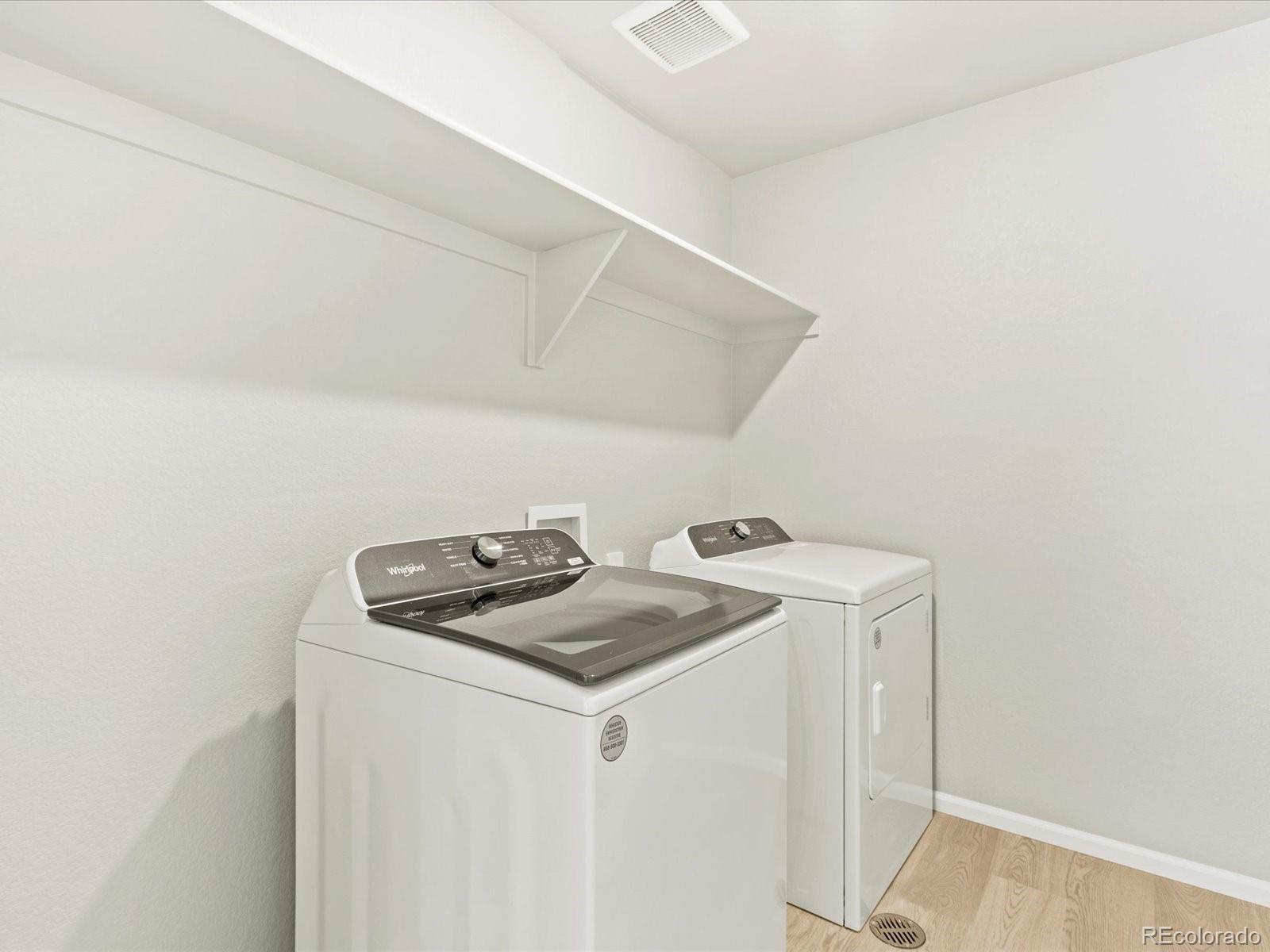 851 Frst Cyn Road Severance, CO 80550 - Photo 28 of 37 a utility room with dryer and washer