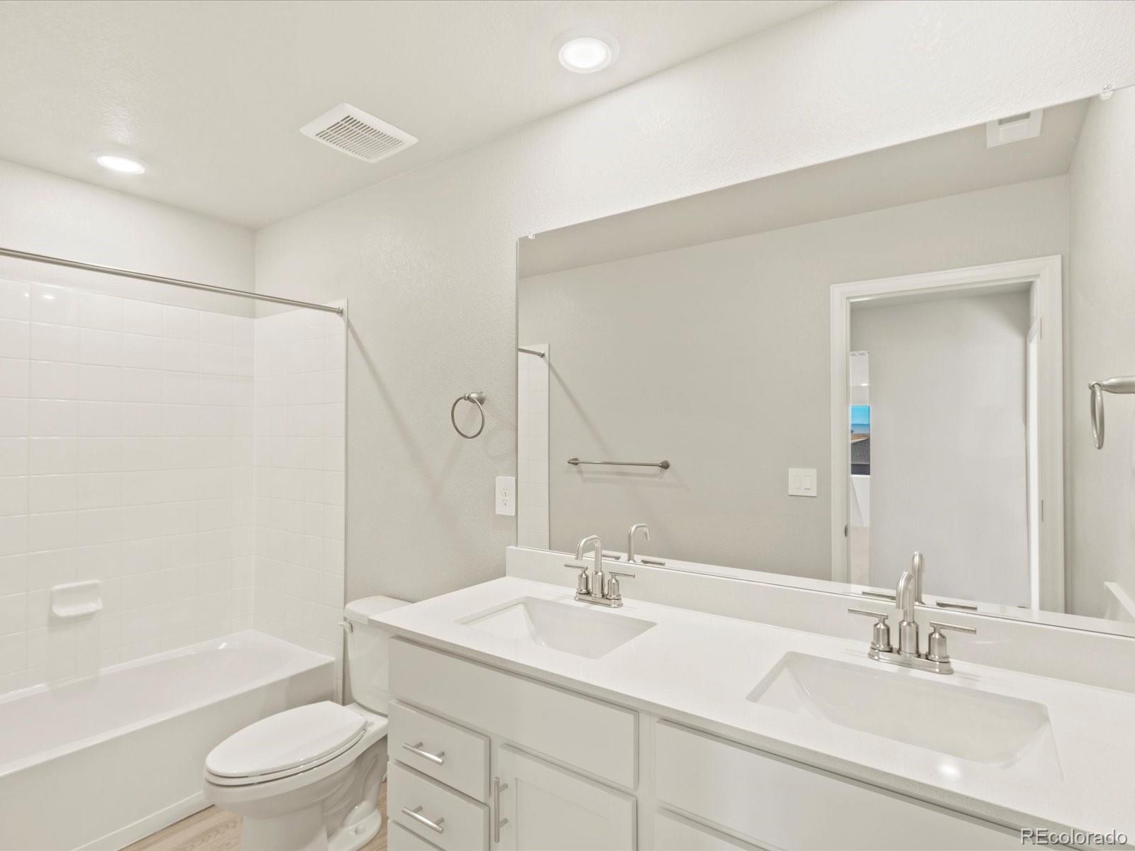 851 Frst Cyn Road Severance, CO 80550 - Photo 32 of 37 a bathroom with a sink a toilet and shower