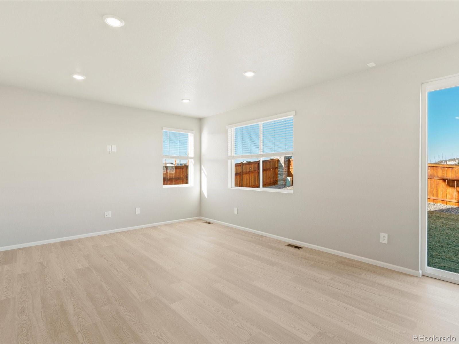 851 Frst Cyn Road Severance, CO 80550 - Photo 8 of 37 an empty room with windows