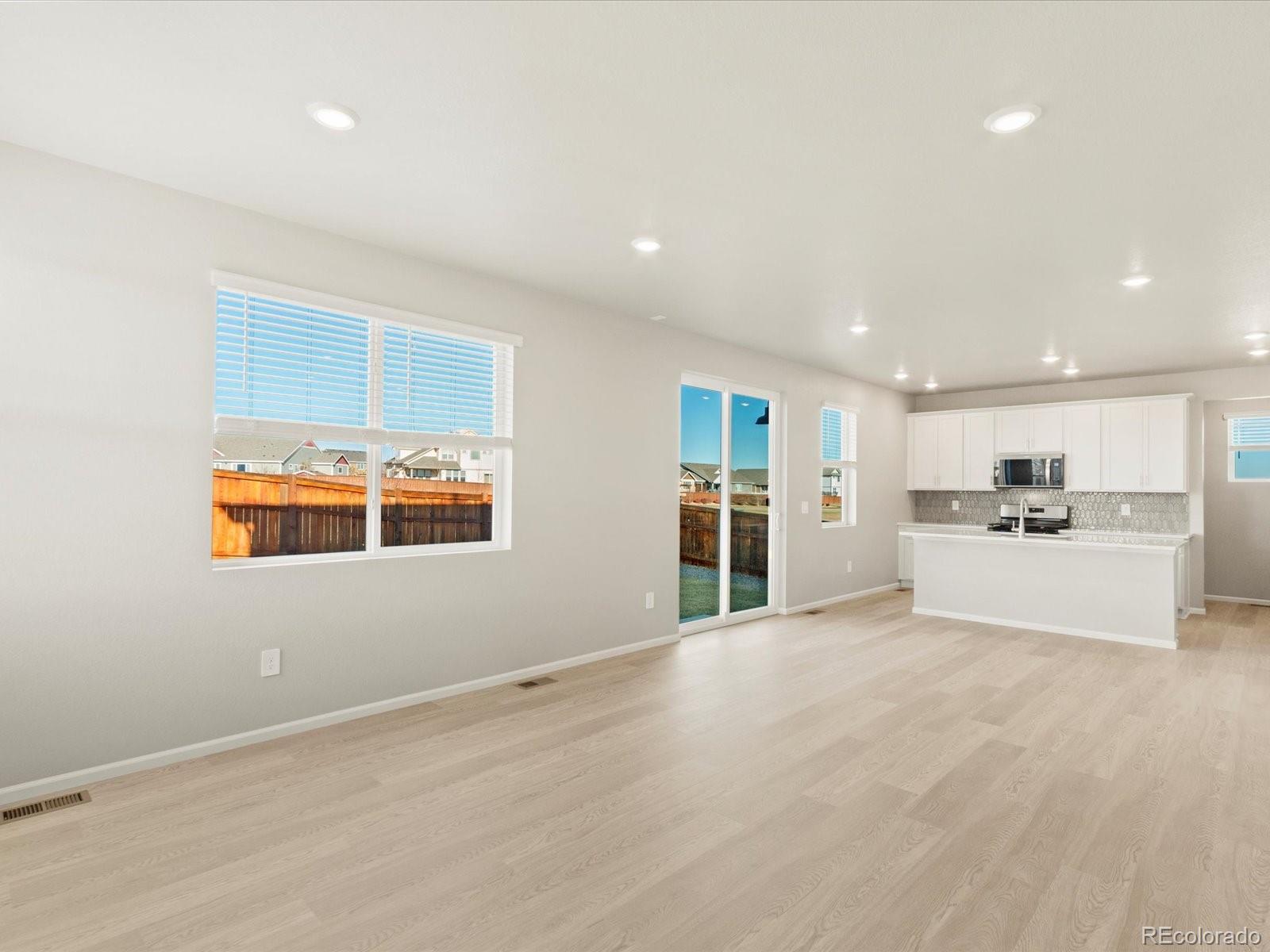851 Frst Cyn Road Severance, CO 80550 - Photo 9 of 37 a view of kitchen with refrigerator and window