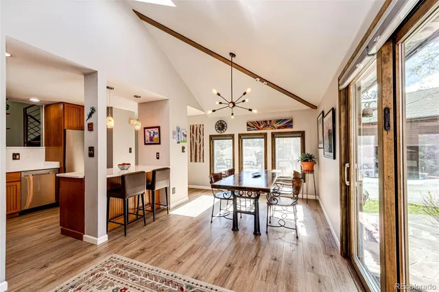 a view of a living room and kitchen