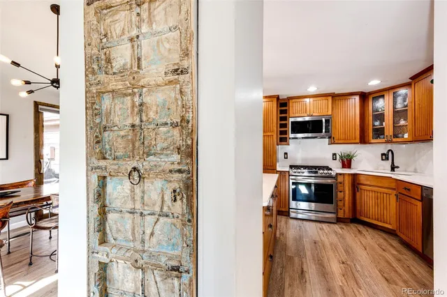 a workspace with furniture and wooden floor