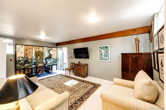 a view of a balcony with mountain view and a fire pit