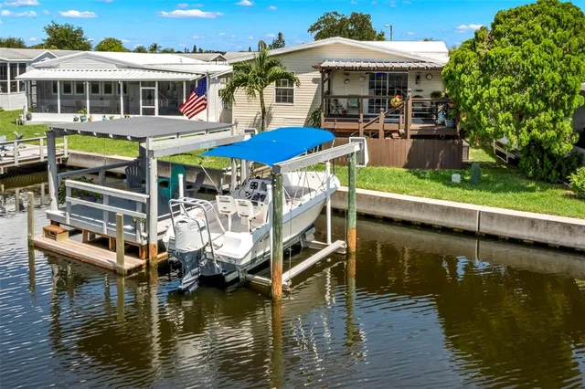 a view of a lake with a house