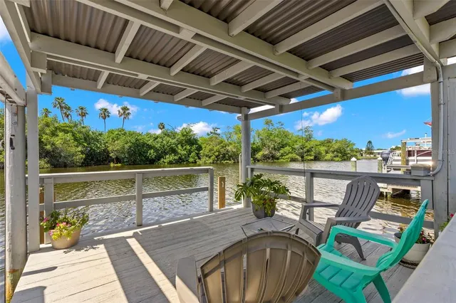 a view of balcony with furniture