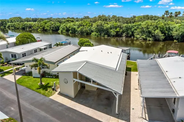 a view of swimming pool with outdoor seating