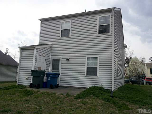 2052 Buffalo Way Durham, NC 27704 - Photo 18 of 20 a view of a house with a backyard