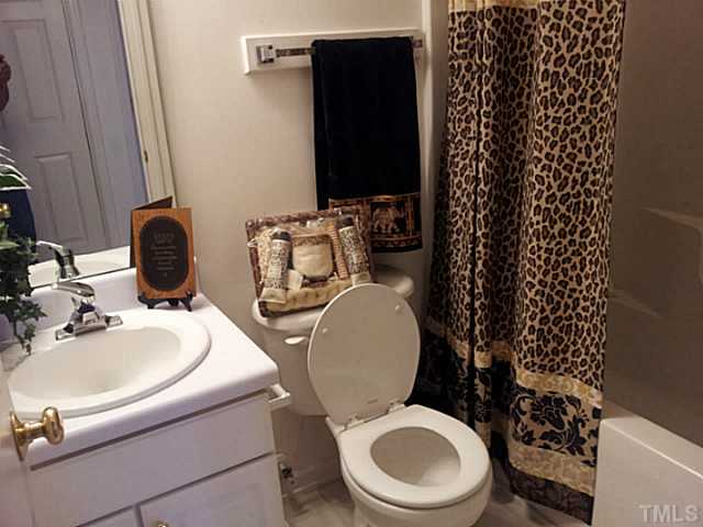 2052 Buffalo Way Durham, NC 27704 - Photo 10 of 20 a bathroom with a sink and a toilet