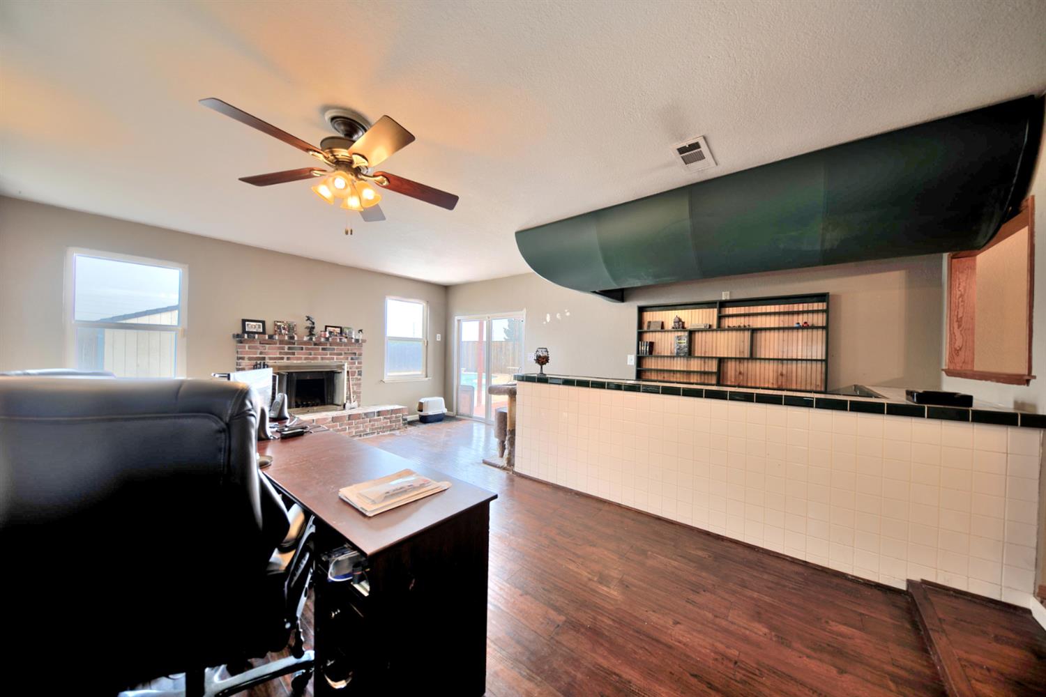 6521 Narcisco Way Hughson, CA 95326 - Photo 19 of 40 a living room with stainless steel appliances furniture and a flat screen tv