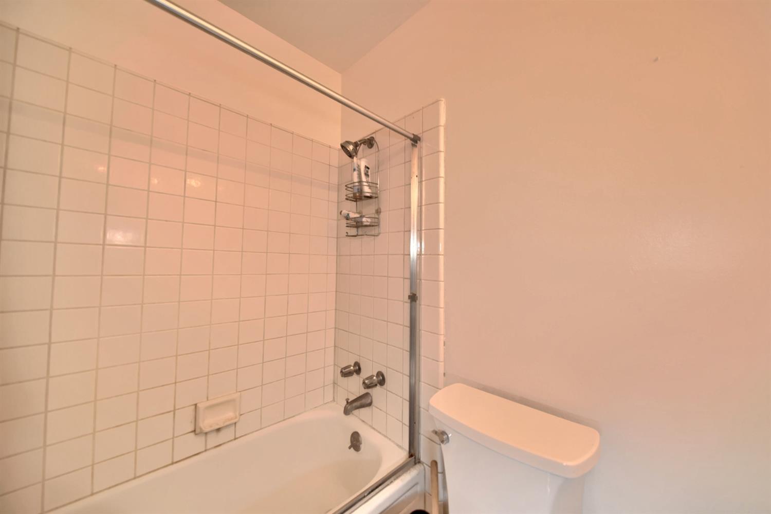 6521 Narcisco Way Hughson, CA 95326 - Photo 21 of 40 a bathroom with a toilet and shower
