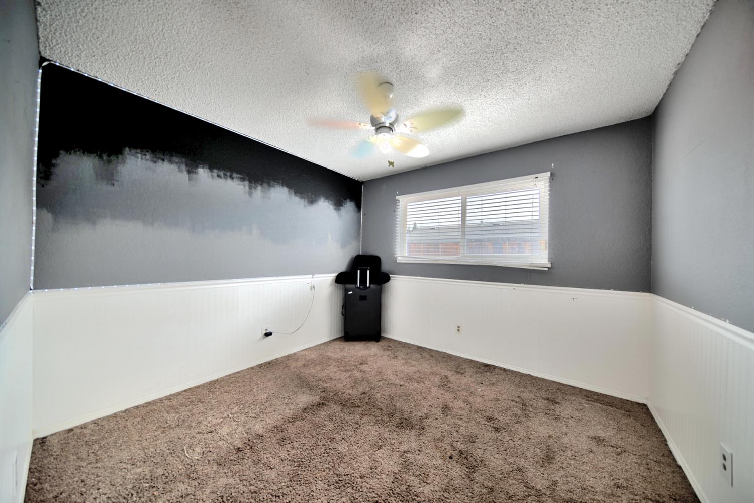 6521 Narcisco Way Hughson, CA 95326 - Photo 24 of 40 a view of an empty room with a window