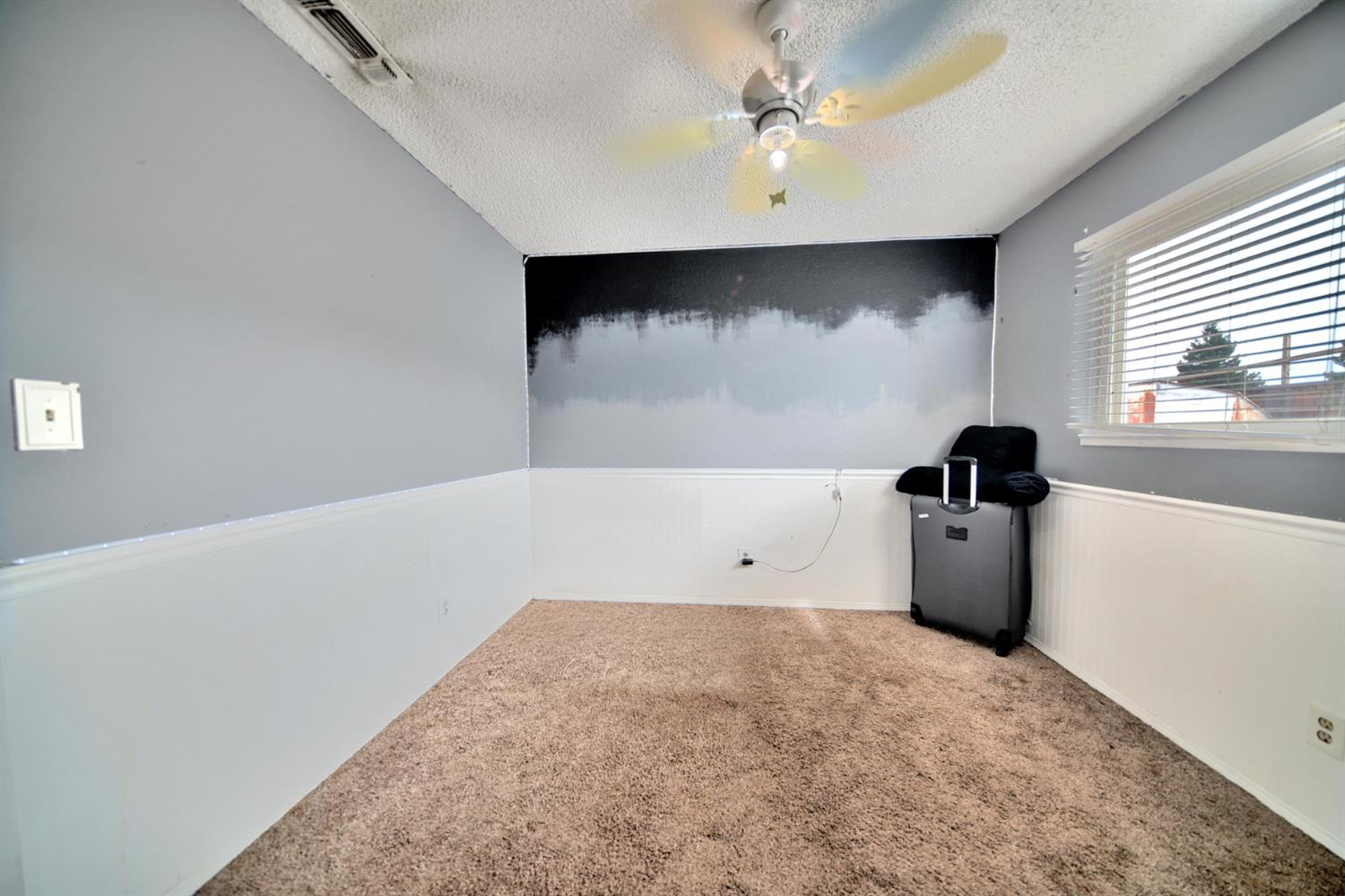 6521 Narcisco Way Hughson, CA 95326 - Photo 25 of 40 wooden floor in an empty room with a window