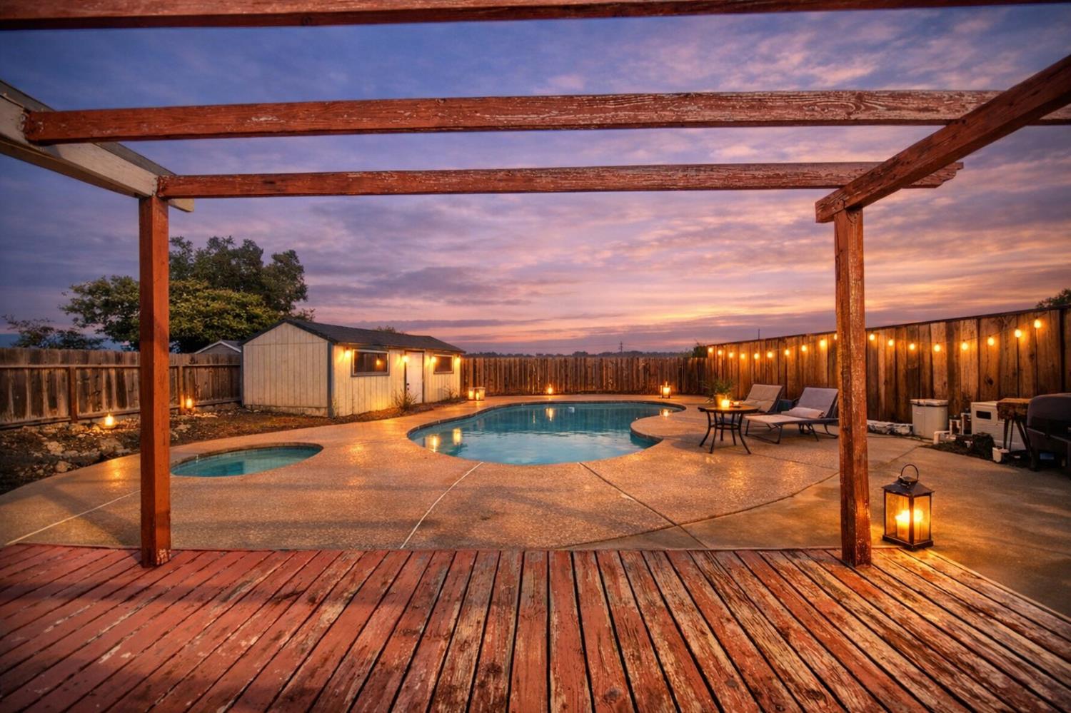 6521 Narcisco Way Hughson, CA 95326 - Photo 30 of 40 a view of a swimming pool with a patio
