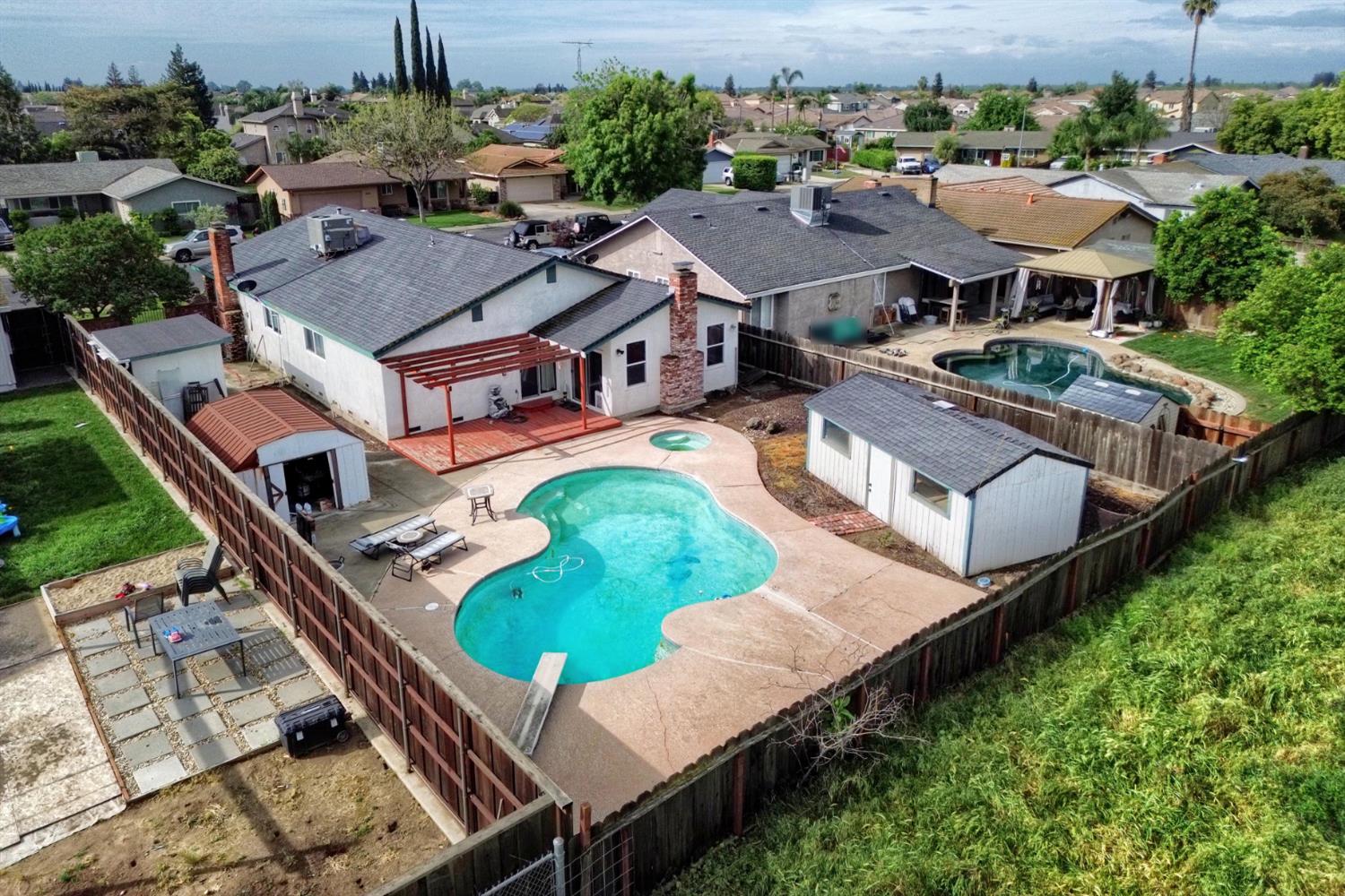 6521 Narcisco Way Hughson, CA 95326 - Photo 38 of 40 an aerial view of residential houses with outdoor space and street view
