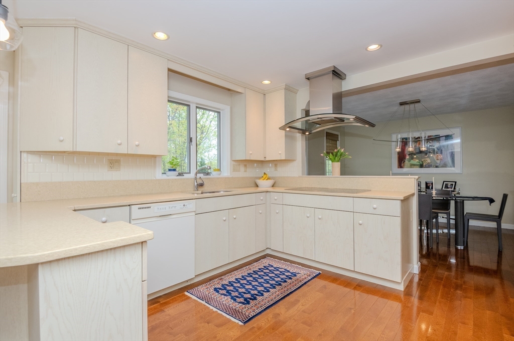25 Ellen Road Stoneham, MA 02180 - Photo 17 of 41 a kitchen with a sink cabinets and window