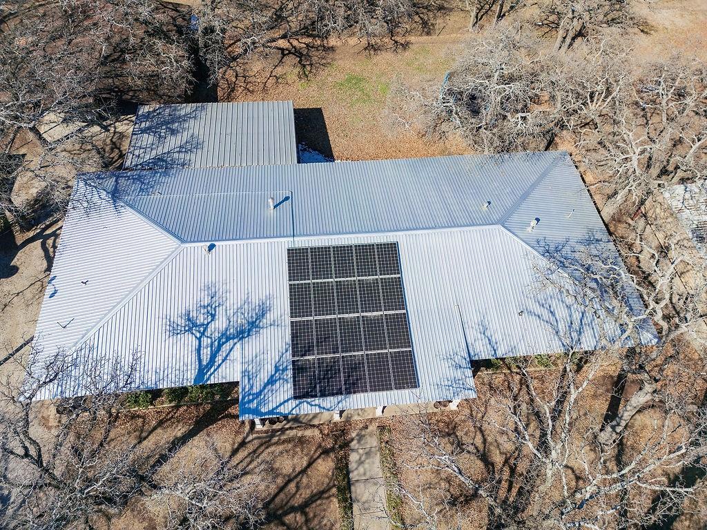 1308 West 14th Street Cisco, TX 76437 - Photo 32 of 39 a view of roof and tree