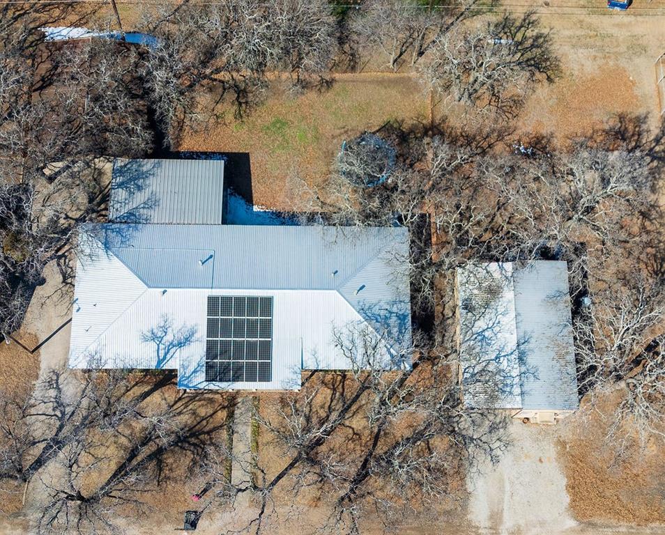1308 West 14th Street Cisco, TX 76437 - Photo 33 of 39 a front view of a house with a yard