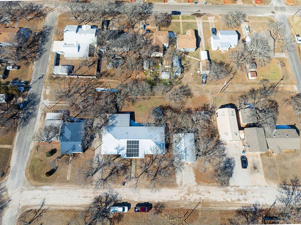 1308 West 14th Street Cisco, TX 76437 - Photo 34 of 39 an aerial view of residential houses with outdoor space