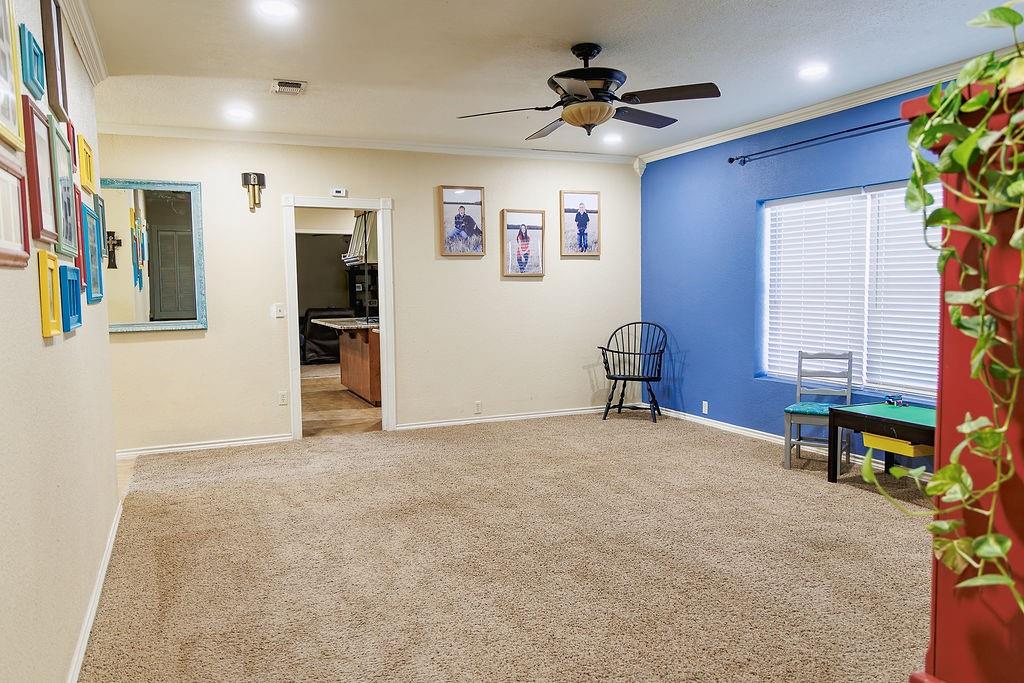 1308 West 14th Street Cisco, TX 76437 - Photo 5 of 39 a view of a livingroom with a workspace