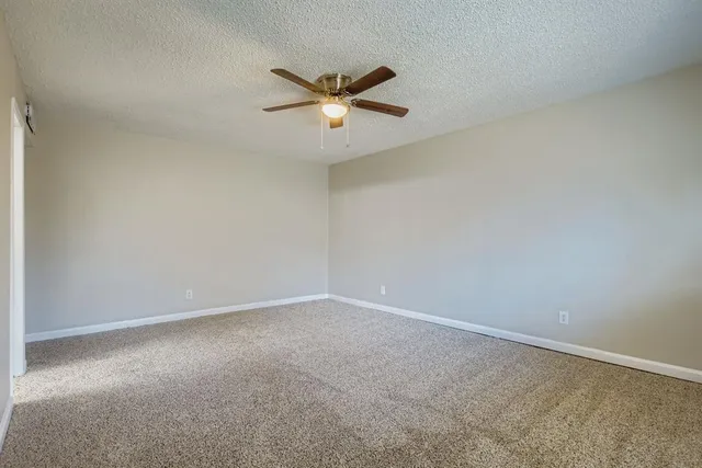 a view of a ceiling fan in a room