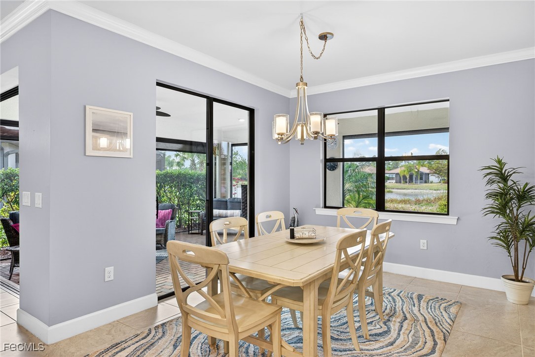 1506 Hyssop Loop North Port, FL 34289 - Photo 11 of 32 a view of a dining room with furniture window and outside view