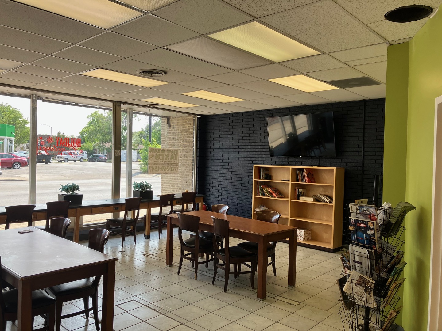 2404 East 79th Street Chicago, IL 60649 - Photo 2 of 22 a view of a dining room with furniture window and outside view