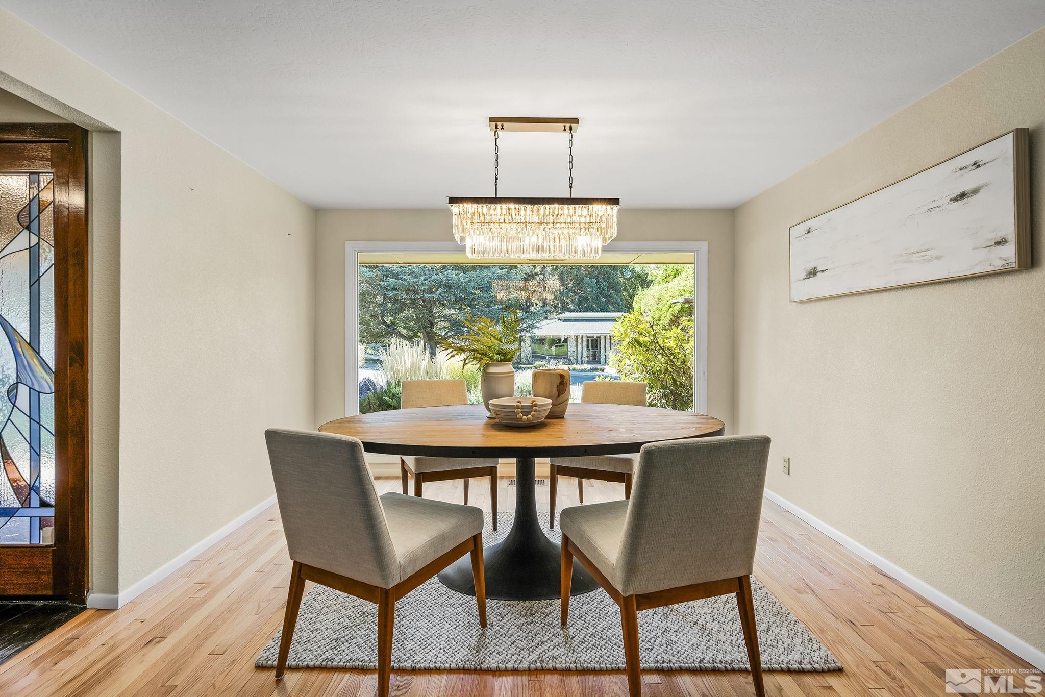 2080 Dant Boulevard Reno, NV 89509 - Photo 14 of 40 a dining room with furniture and wooden floor