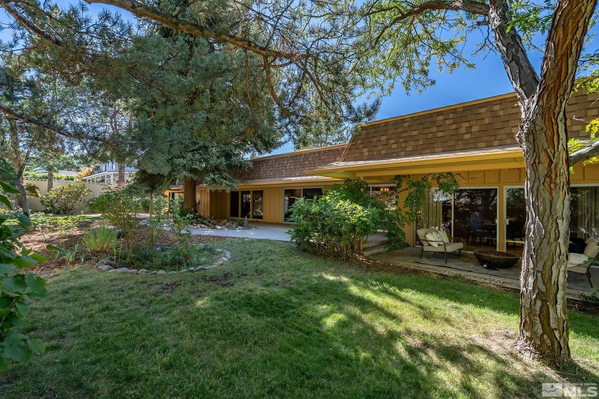 2080 Dant Boulevard Reno, NV 89509 - Photo 38 of 40 a view of a house with backyard garden and patio