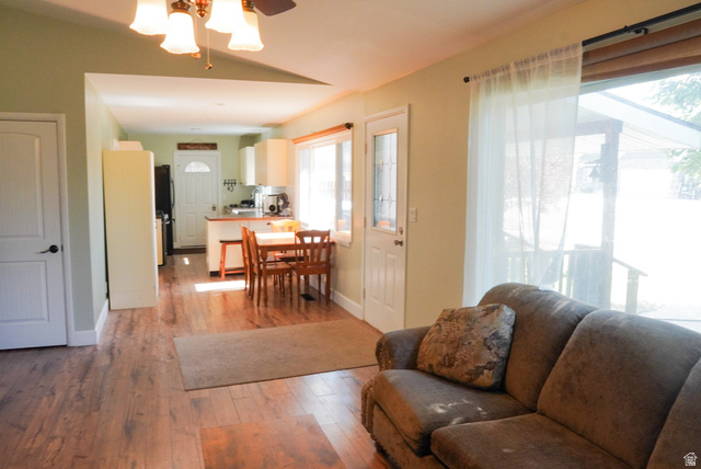 324 Stringtown Road Georgetown, ID 83239 - Photo 10 of 49 Living area featuring light wood finished floors and baseboards