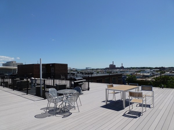 154 West 2nd Street, Unit 401 Boston, MA 02127 - Photo 9 of 10 a view of a terrace with furniture