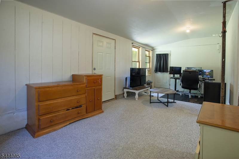 79 Lake Wallkill Road Vernon, NJ 07461 - Photo 18 of 27 a view of room with couch and a dresser