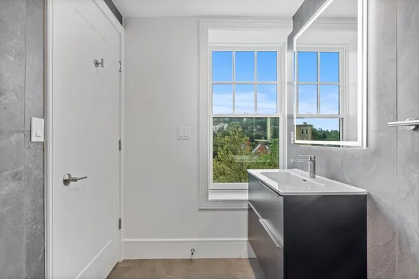 a bathroom with a sink and a shower