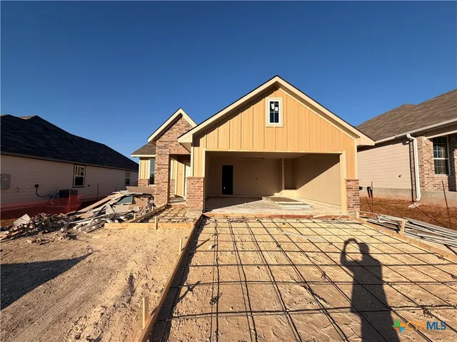 a view of a house with snow