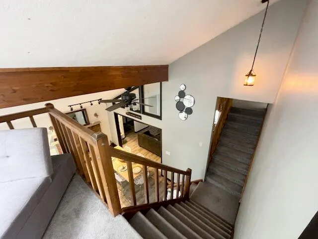 a view of a balcony with furniture