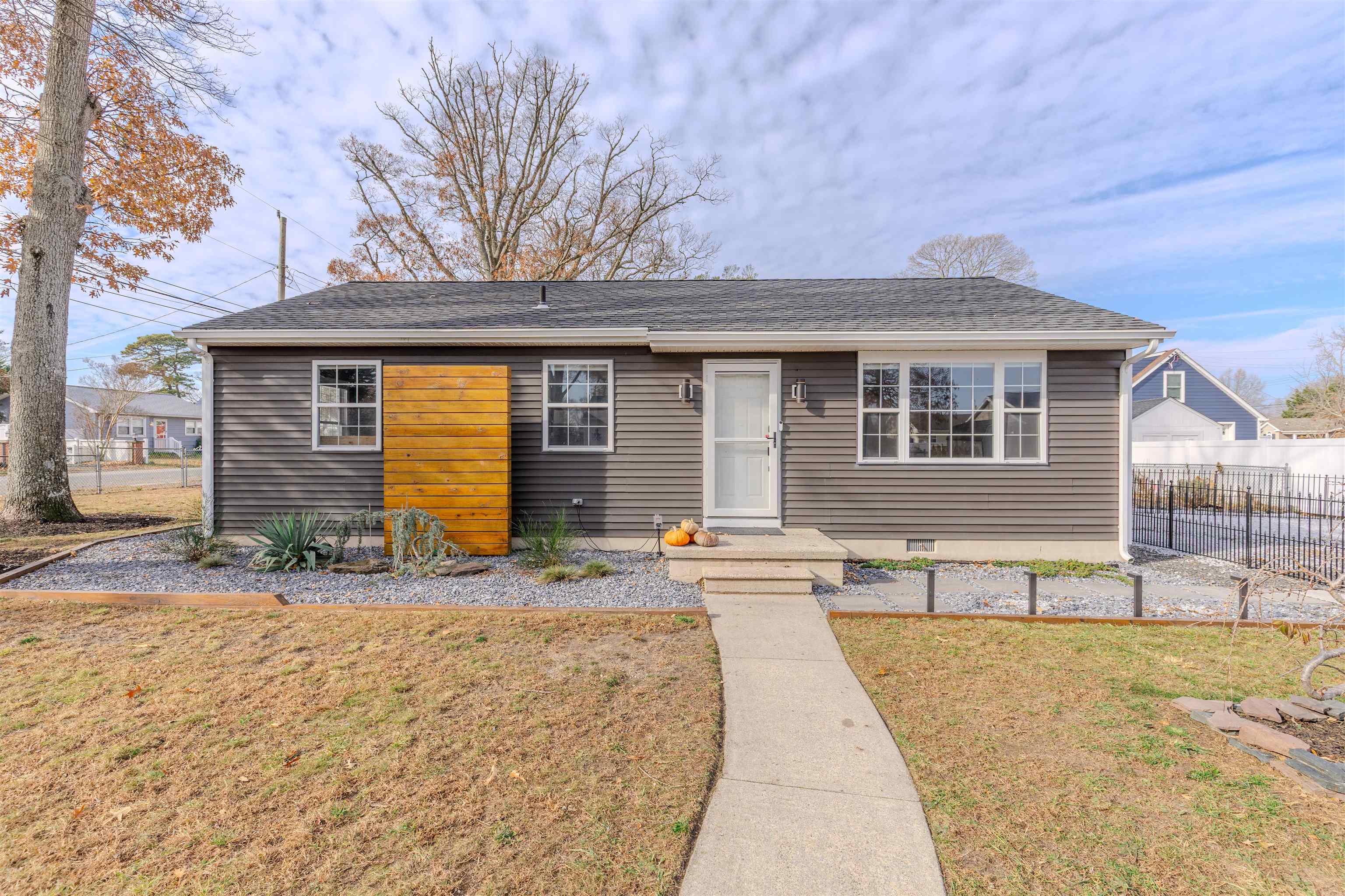 87 Rose Villas, NJ 08251 - Photo 1 of 27 a front view of a house with a yard