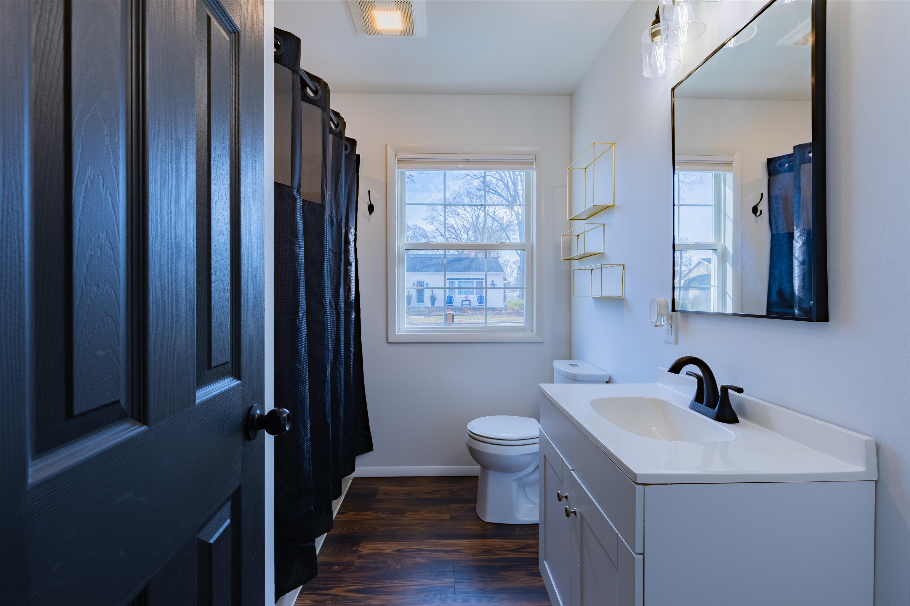 87 Rose Villas, NJ 08251 - Photo 14 of 27 a bathroom with a sink and a mirror
