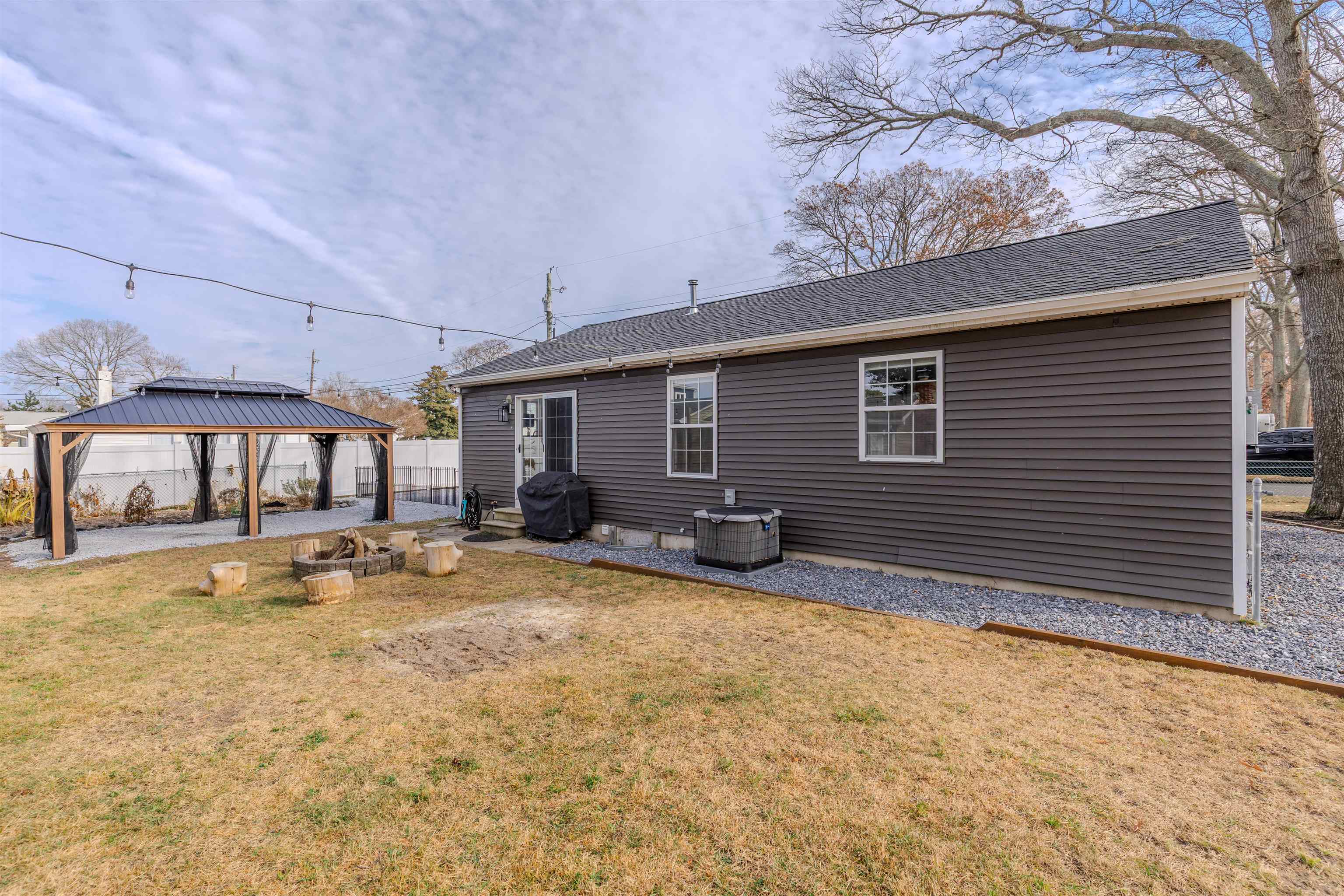 87 Rose Villas, NJ 08251 - Photo 21 of 27 a view of a house with a patio