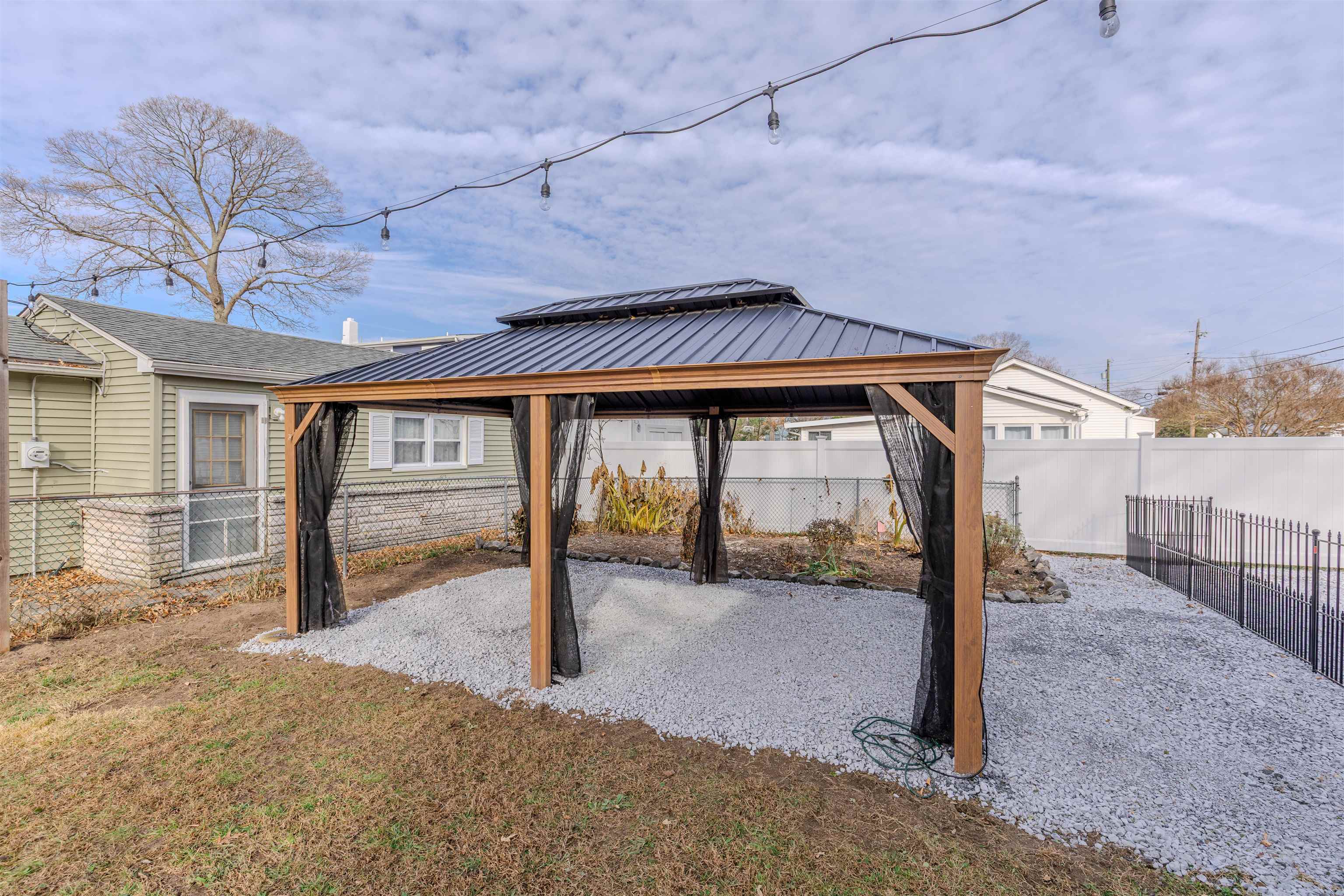 87 Rose Villas, NJ 08251 - Photo 22 of 27 a front view of a house with a outdoor space