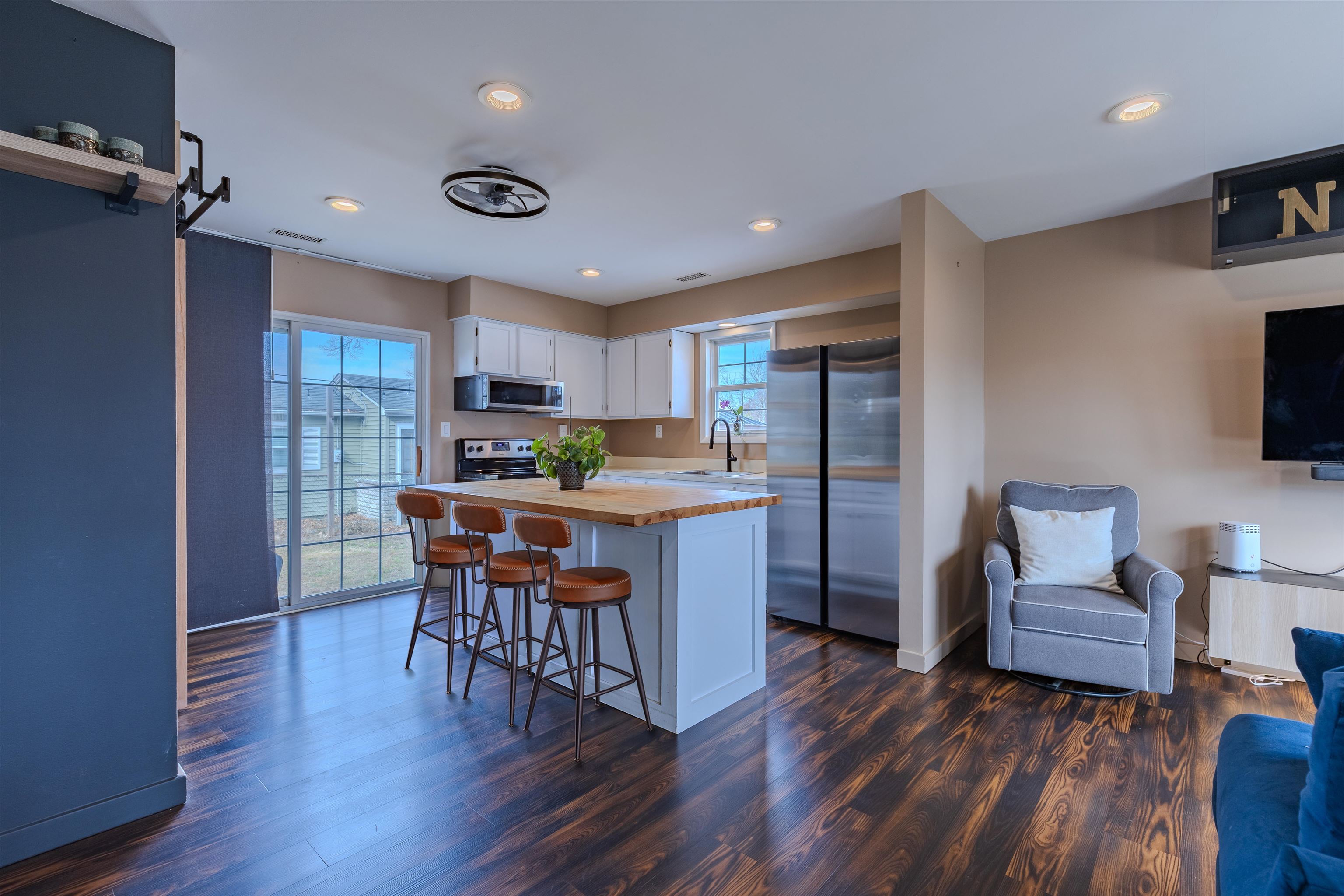 87 Rose Villas, NJ 08251 - Photo 5 of 27 a kitchen with a table chairs refrigerator and cabinets